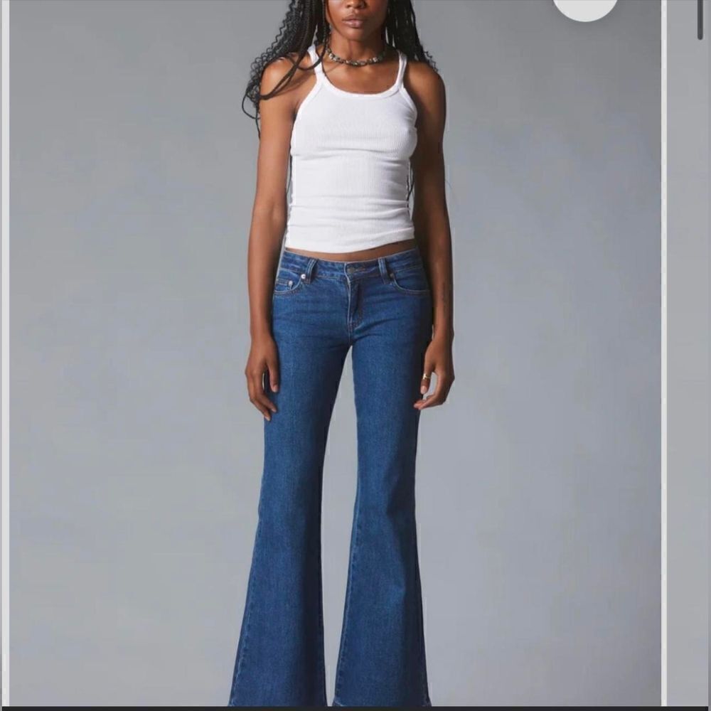 Unif bell bottom blue jeans